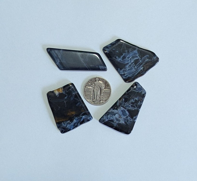 Four polished Pietersite stones